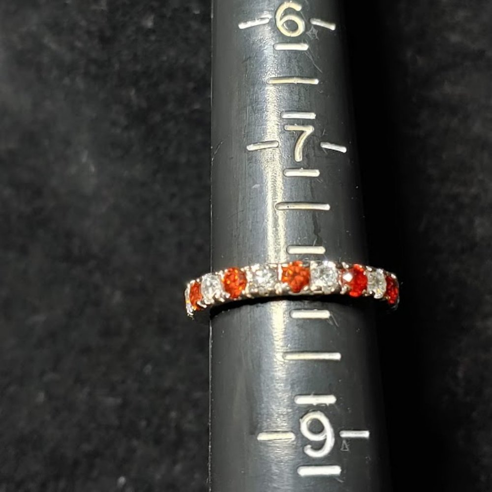 Simulated Garnet and Diamond Eternity Band